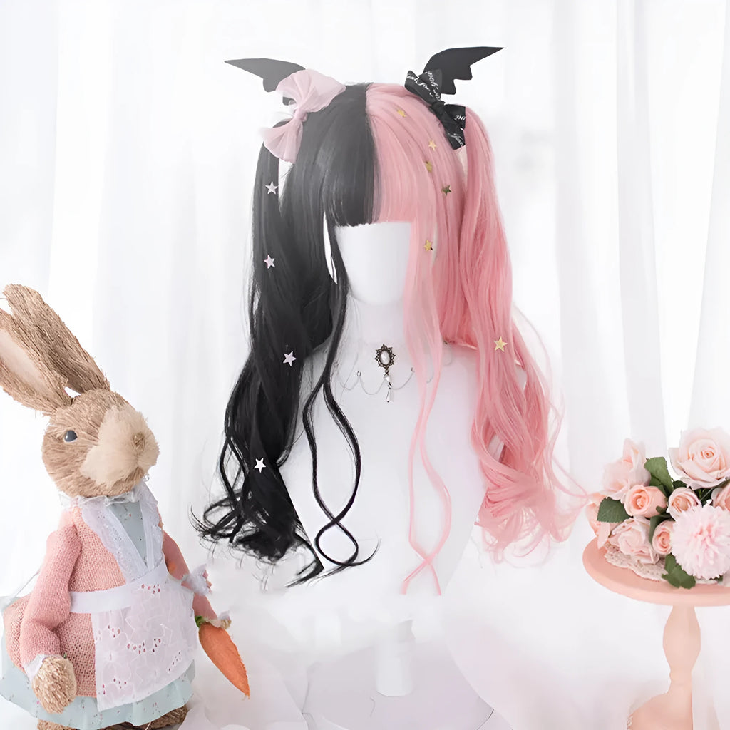 Long curly black and pink Lolita cosplay wig with a fringe on a display head.