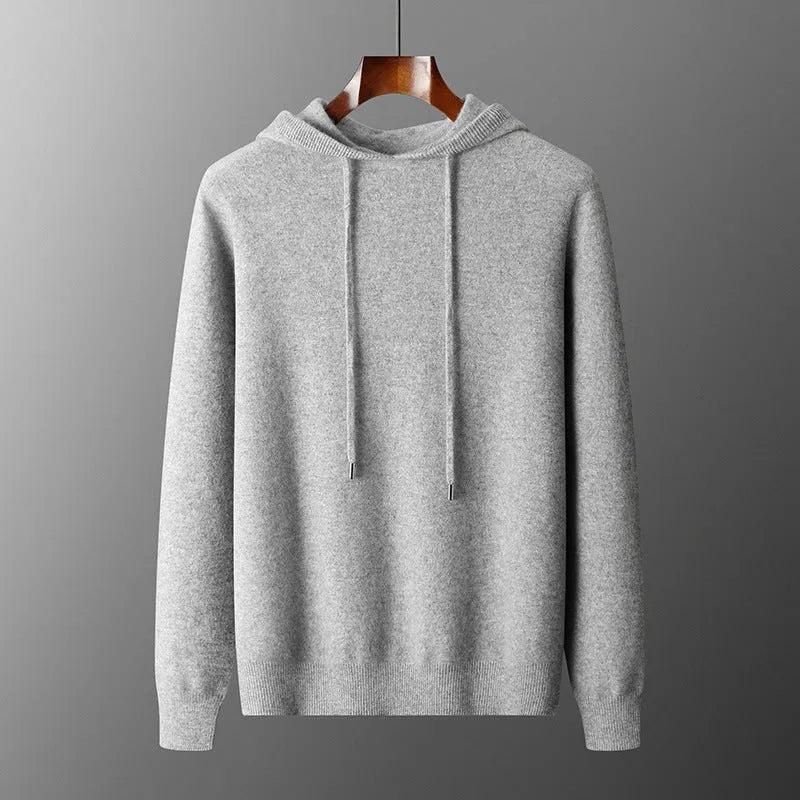 Men's light grey cashmere hooded sweatshirt and matching trousers set laid flat.