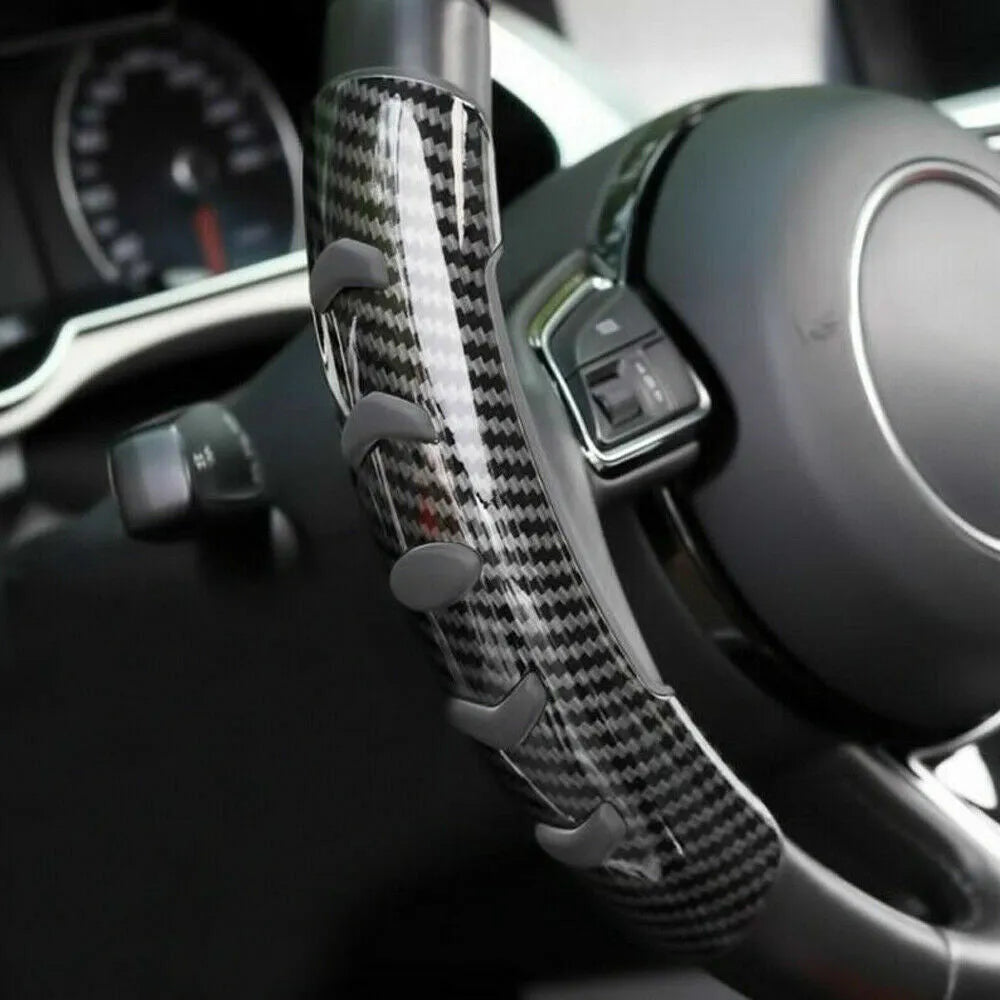 Carbon fibre black steering wheel anti-slip sleeve for 38cm diameter car wheels.