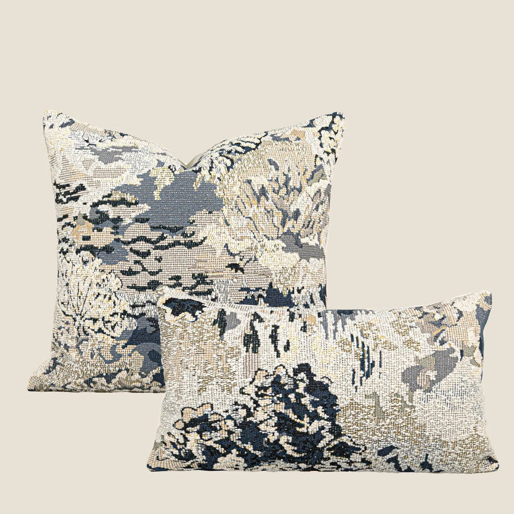 Antique blue wool blend decorative pillow with abstract flower pattern in square and waist pillow sizes.