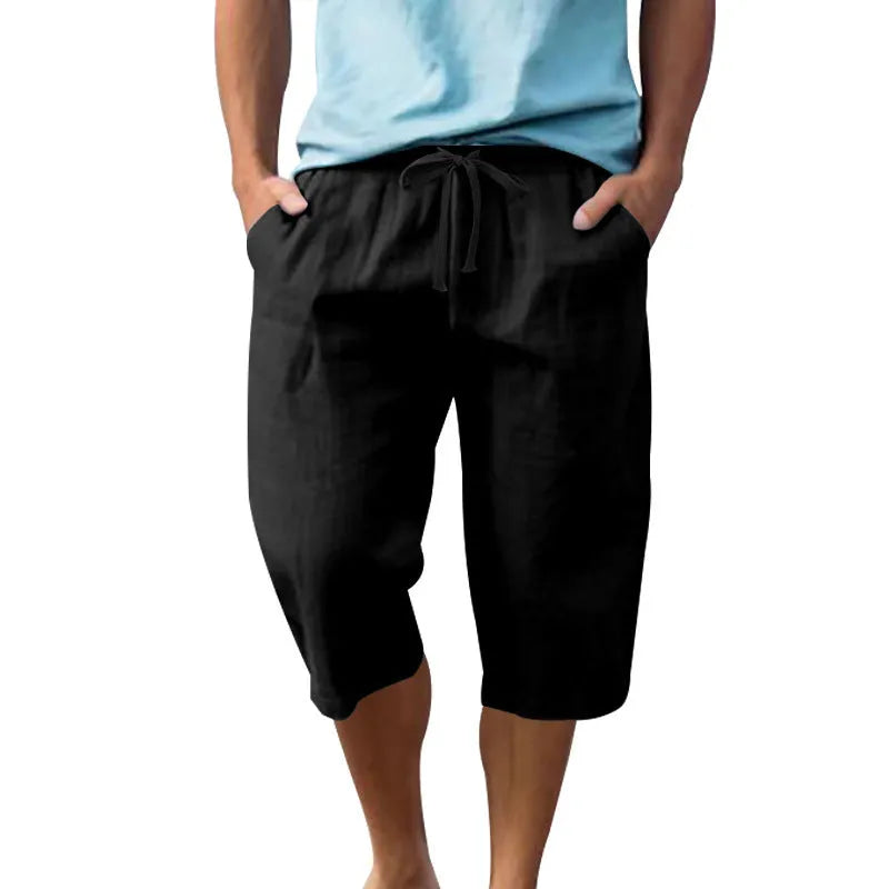 Men's solid colour linen shorts with a drawstring waistband in a light blue shade