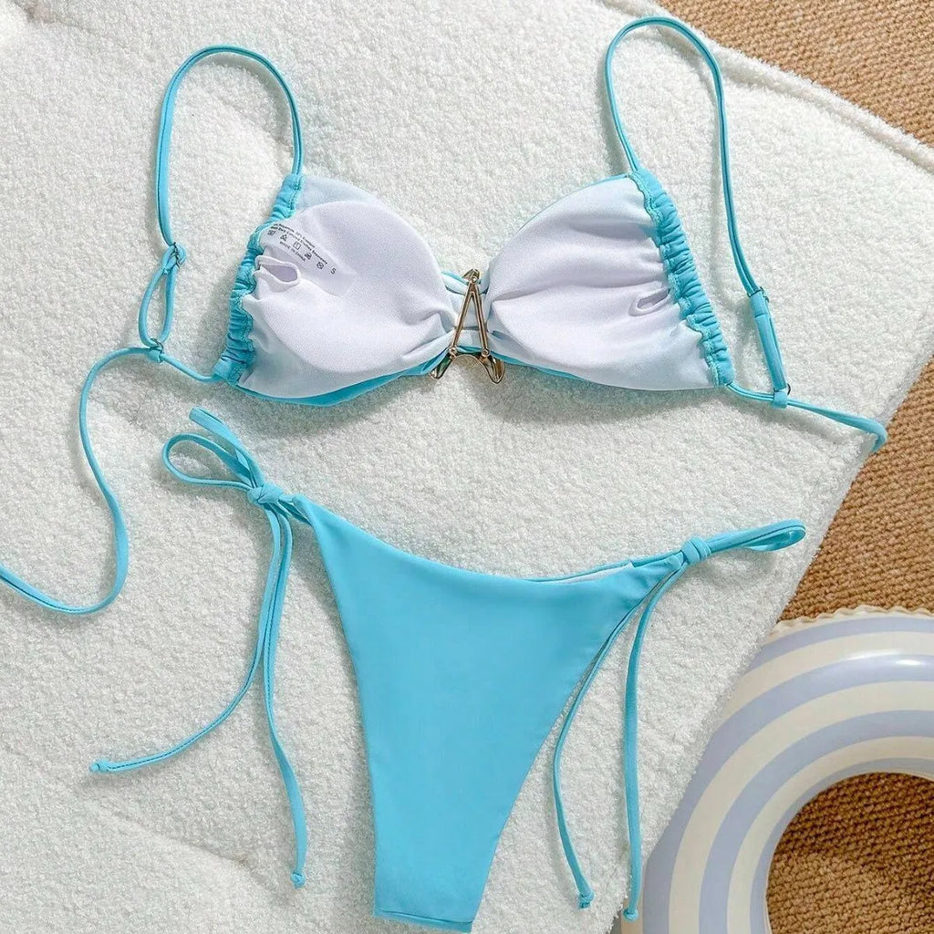 XINGX women's split bikini in solid colour with backless briefs, available in sky blue, black, or brown for swimming and wading.