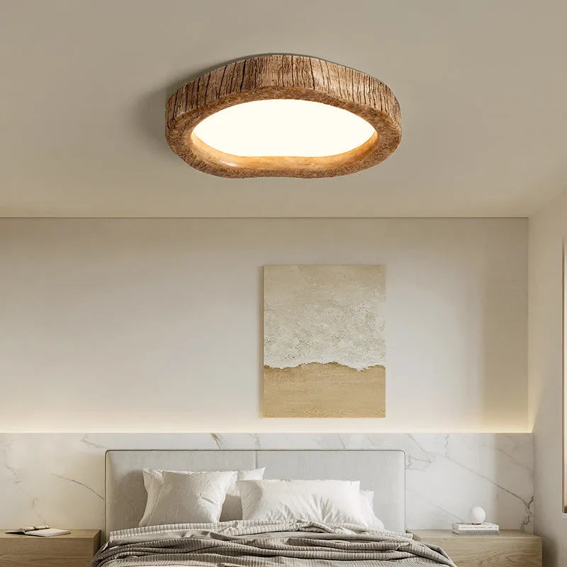 Wood grain finish round ceiling lamp in a new Chinese style design for bedroom lighting.