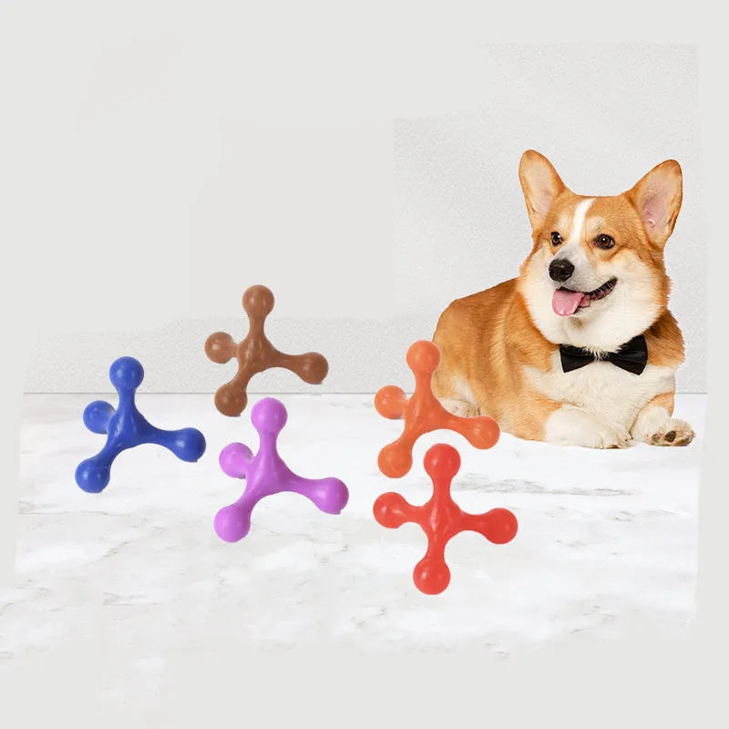 Blue silicone dog chew toy shaped like a bone with three legs, shown next to a small puppy.