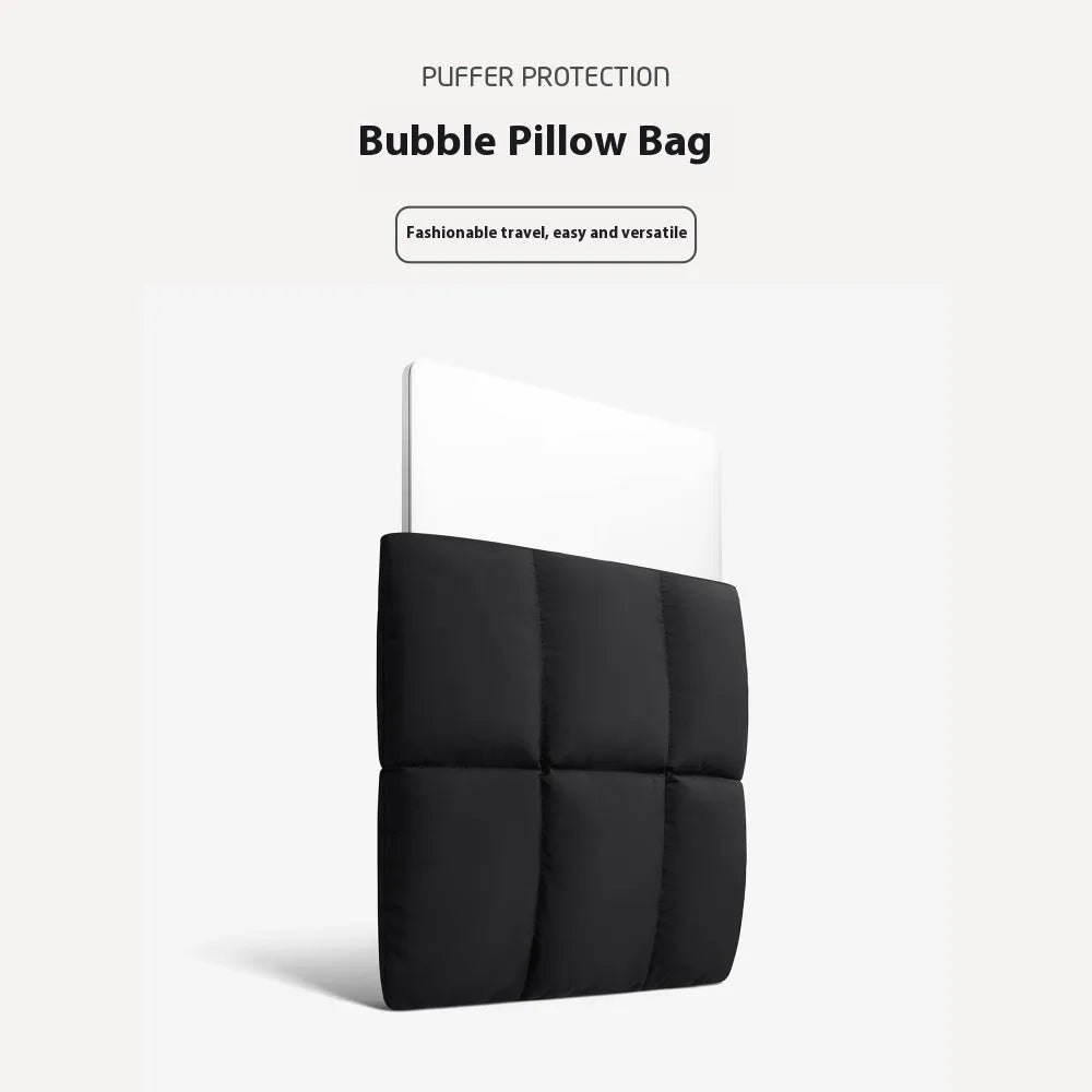 Soft black polyester laptop sleeve with sewing thread detail fitting 13-inch to 15.6-inch laptops