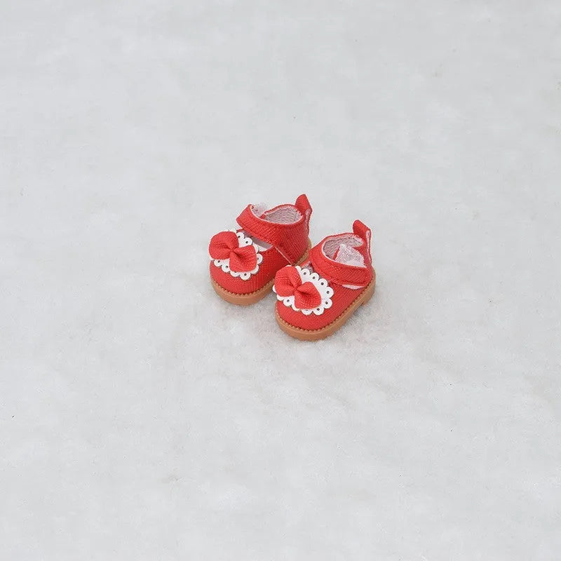 A pair of polyurethane doll shoe accessories for a 17cm figure, shown in a selected style and colour.