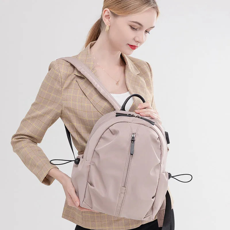 Women's Korean-style simple business travel backpack in dirty pink, Oxford cloth, with computer pocket, small A4 size