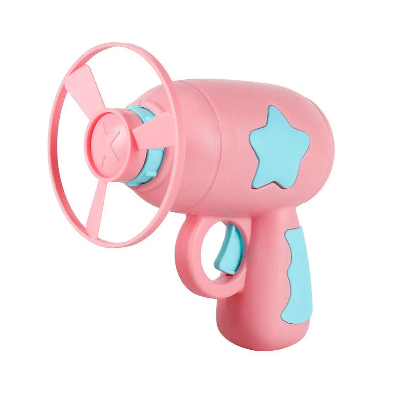 Blue LED flying saucer launcher toy set with gun, three luminous discs, and target board on packaging.