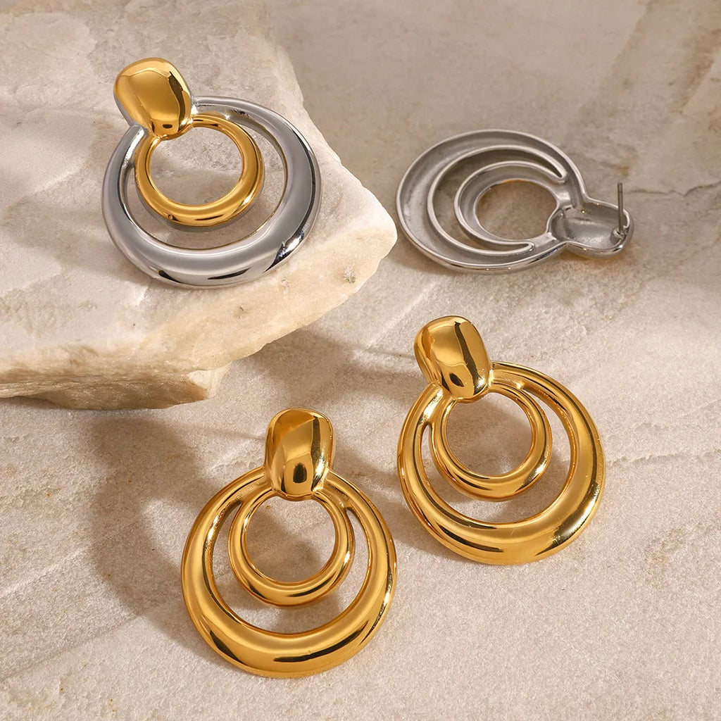 18K gold electroplated titanium steel hollow stud earrings with double layer geometric round design
