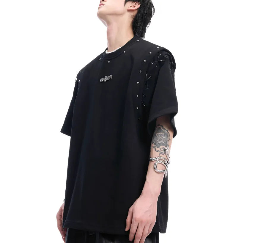 Black deconstructed short sleeve T-shirt with lace-up sides and cutout detailing on a mannequin.