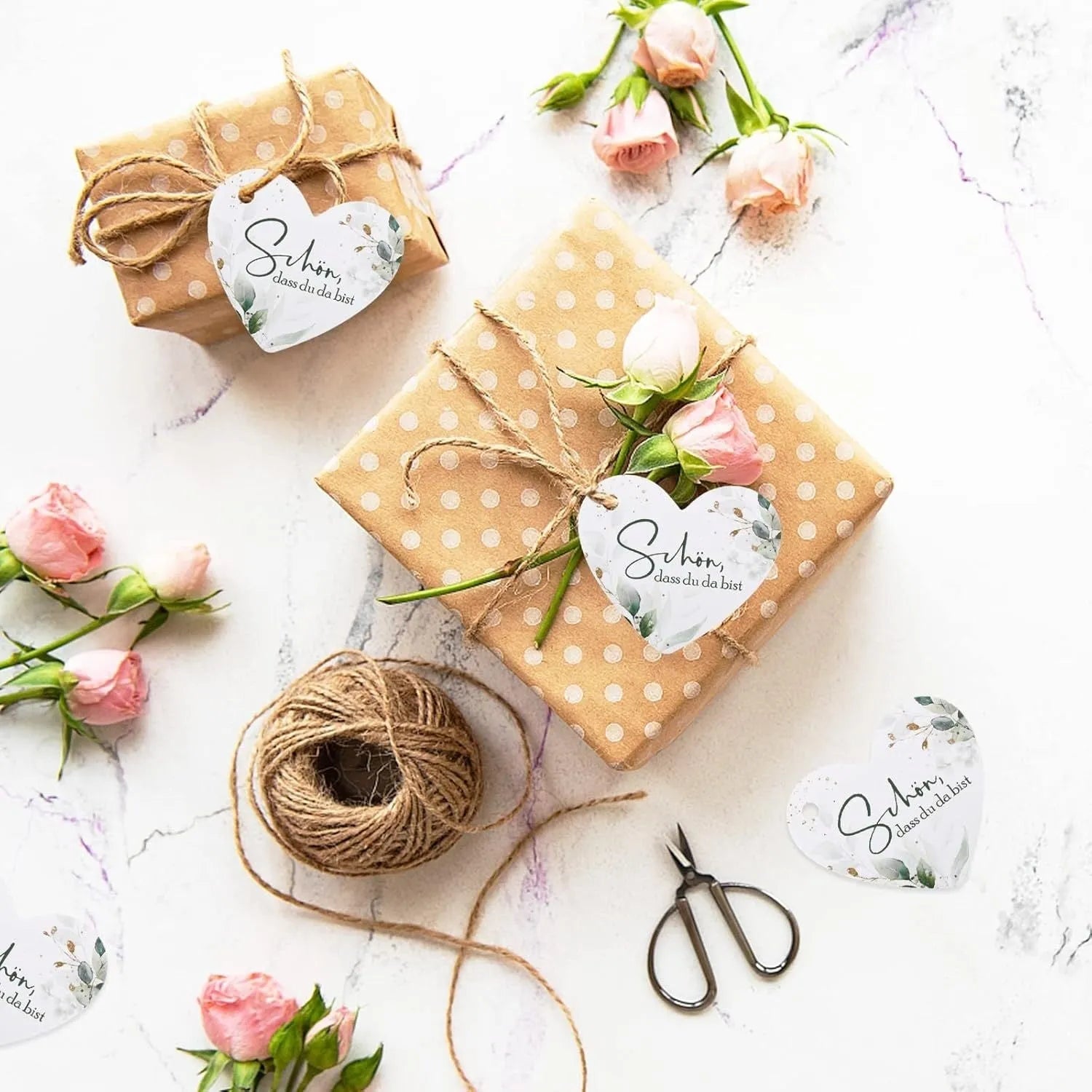 Set of 50 flower heart-shaped paper gift tags in two colour style options.