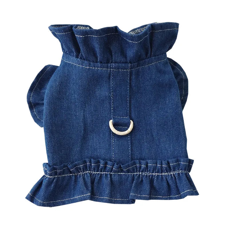 Blue denim dog dress with ruffles vest detail and a metal leash hook on the chest.