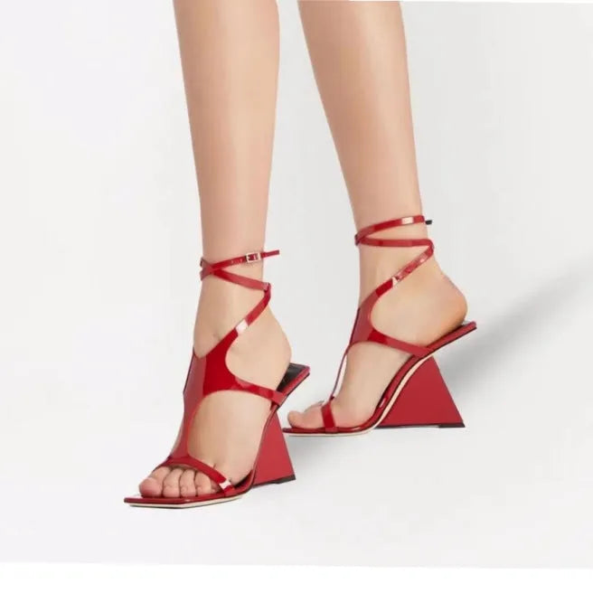 Women's black high heel sandals with a square toe, 9.5cm stiletto heel, and button ankle strap.