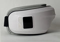 White eye massager with 16D airbag system, hot compress, and Bluetooth music for migraine relief
