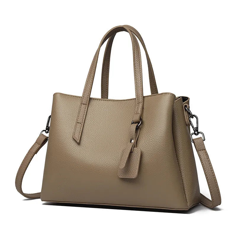 Women's genuine cowhide leather handbag in horizontal square shape with multiple internal compartments