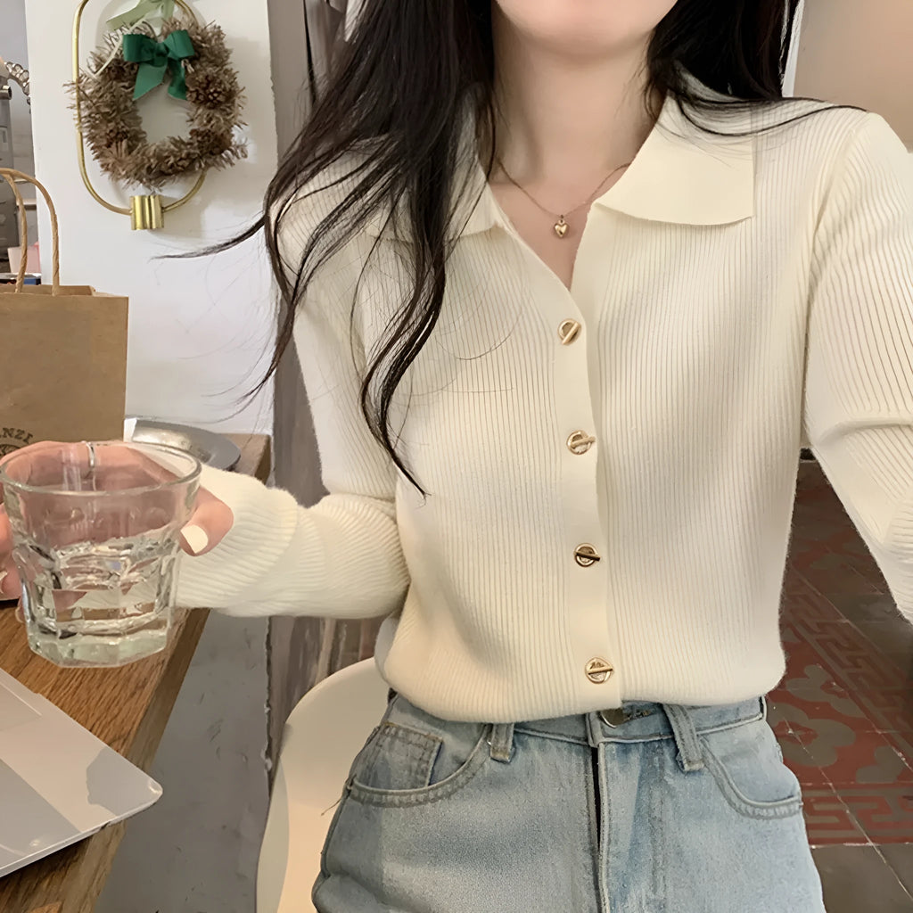 Women's long-sleeved loose fit viscose cardigan top in beige, shown as a layering piece.