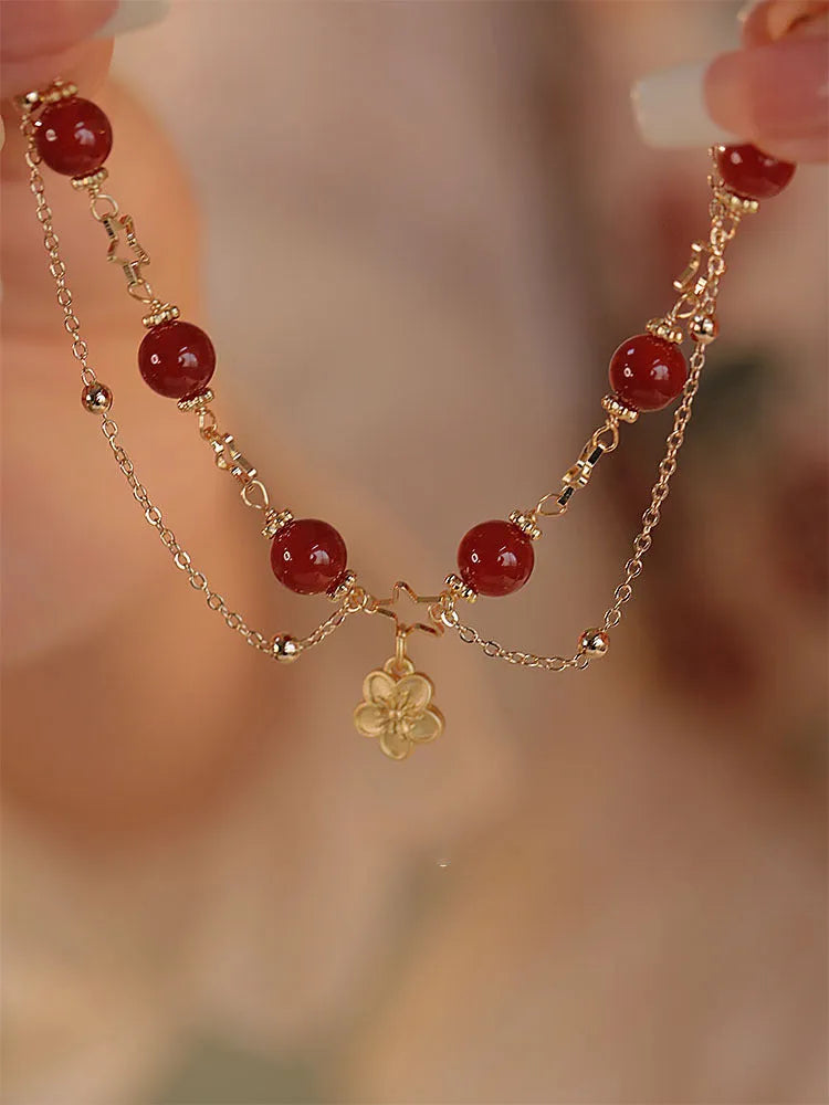 Women's red agate double layer bracelet with peach blossom design and manual processing