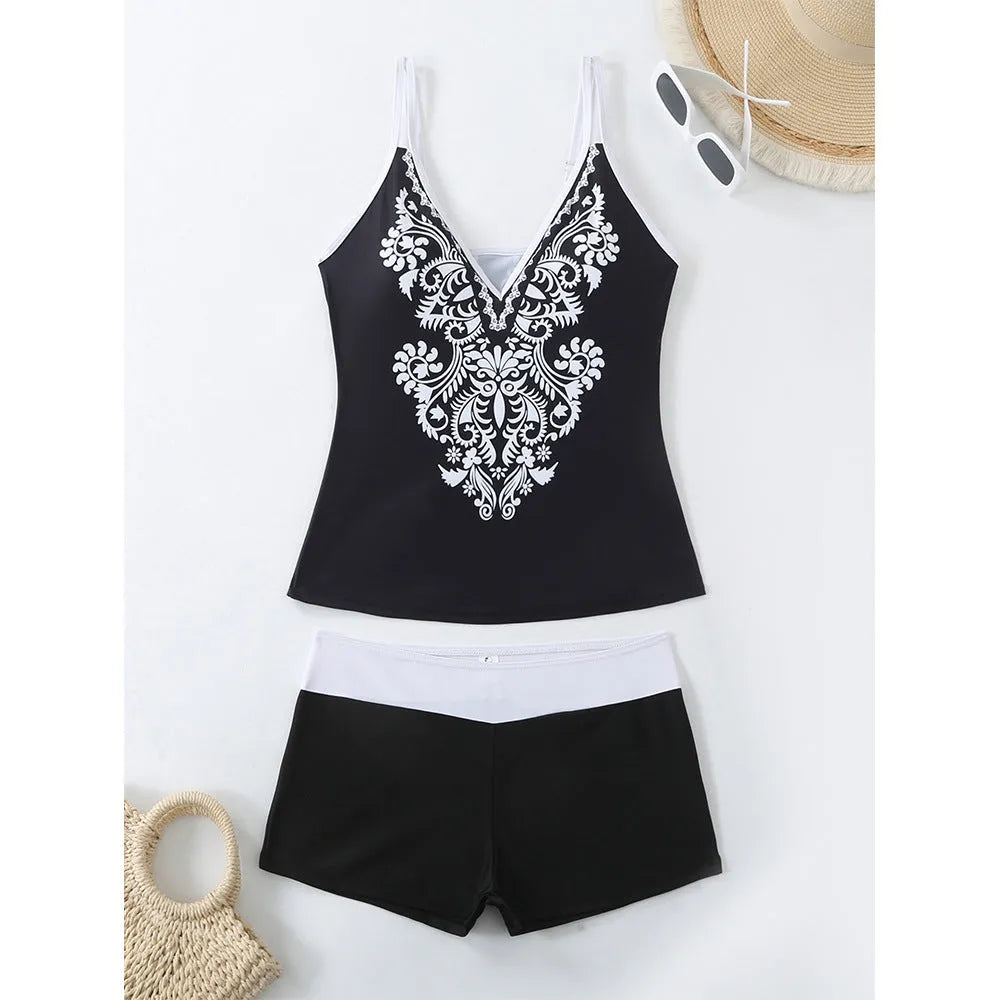 Women's plus size printed two-piece swimsuit set in black or rose red.