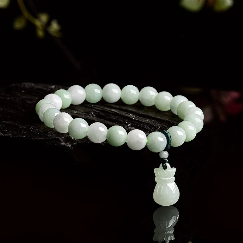 Jade stone bracelet with 8mm flower carving in unisex design for men and women