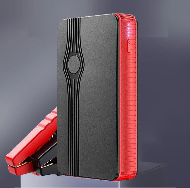Red K4-E automobile emergency jump starter and portable power bank with USB port.