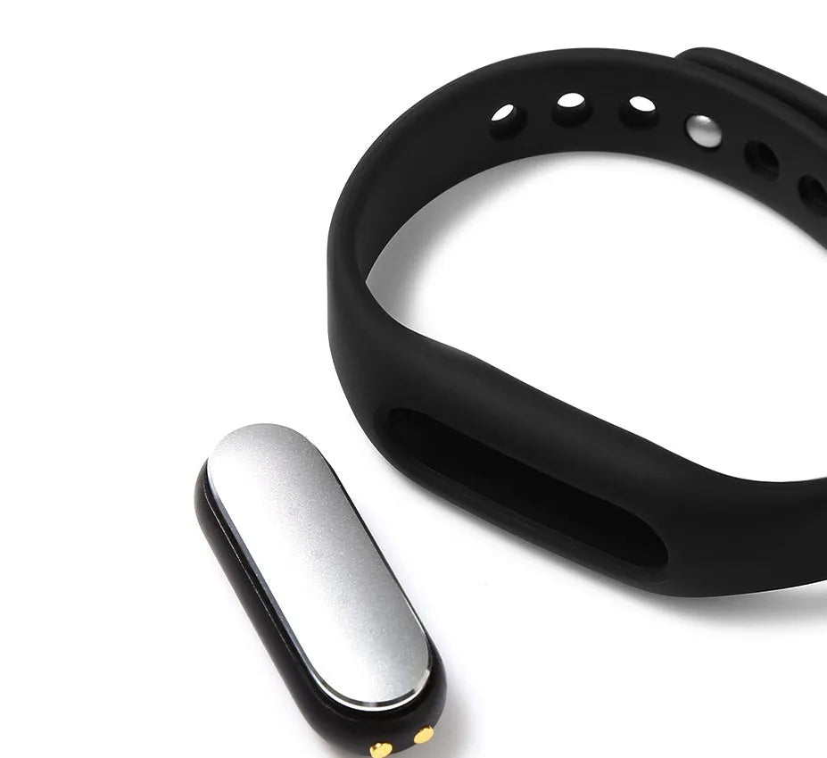 Xiaomi Mi Band 1S black fitness wristband with heart rate sensor and IP67 waterproof rating on wrist