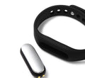 Xiaomi Mi Band 1S black fitness wristband with heart rate sensor and IP67 waterproof rating on wrist