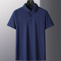 Man wearing a solid colour short sleeve non-ironing business casual shirt in a neutral tone.