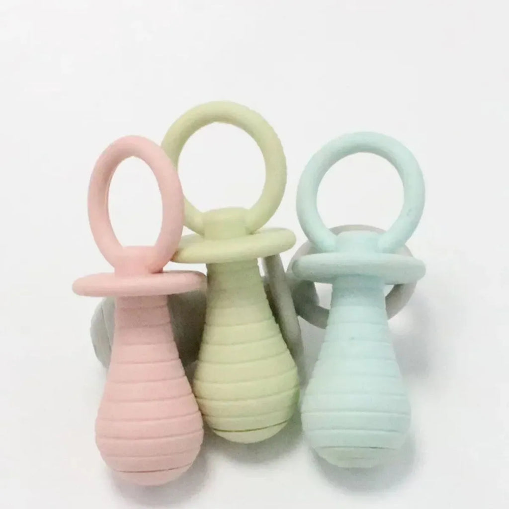 Four coloured pet pacifier chew toys with squeaker for puppies and kittens