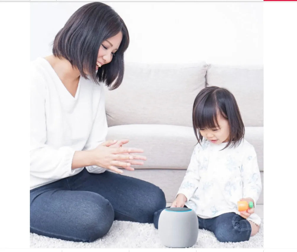 Compact AI smart speaker with voice control and Bluetooth connectivity.