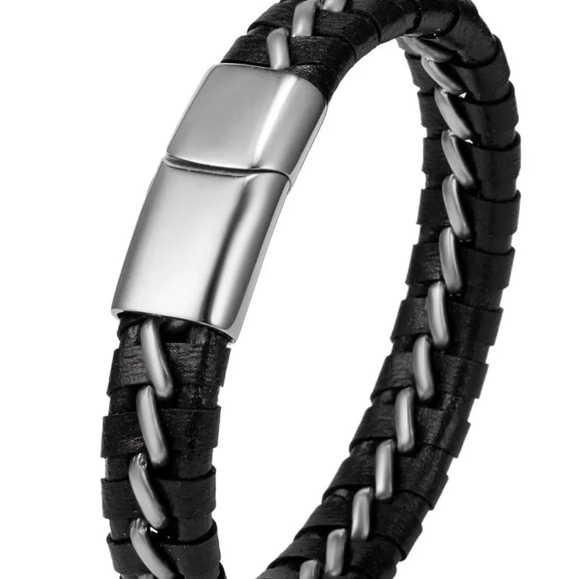 Woven leather bracelet for men with silver alloy cuff on a neutral background