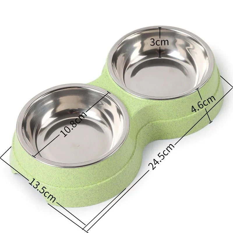 Double pet bowl set with two stainless steel bowls and blue straw holder on white background