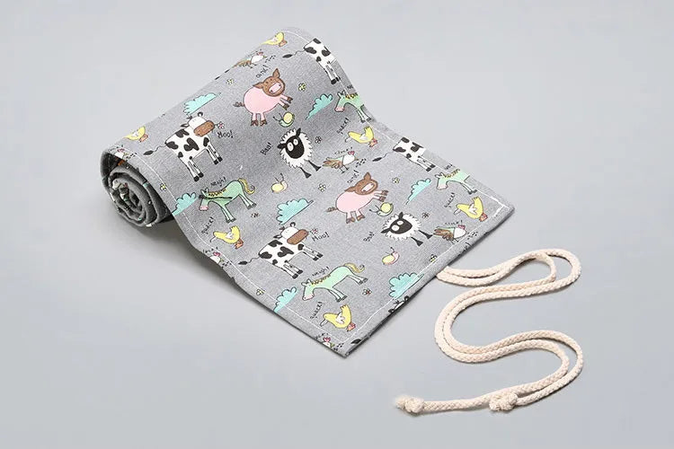 Canvas pencil wrap roll up case with elastic bands showing multiple slots for pens and pencils