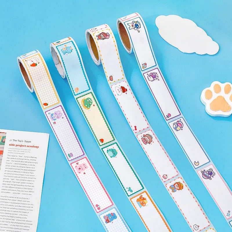 Roll of colourful cartoon name tape stickers showing dinosaur, astronaut, rabbit, and girl designs.