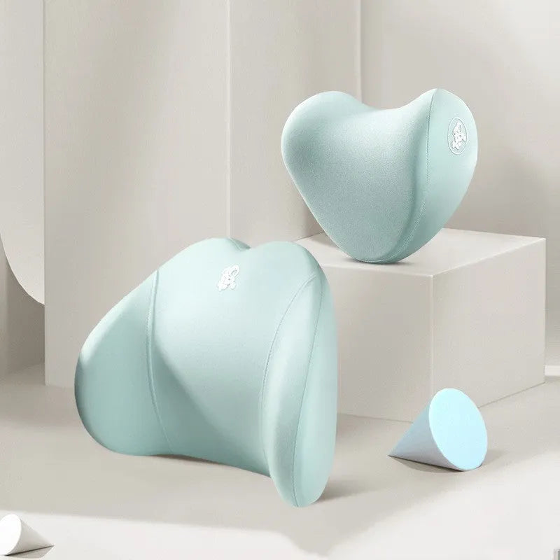 Heart-shaped car pillow set with headrest and lumbar support pillow in soft cotton, shown in assorted colours