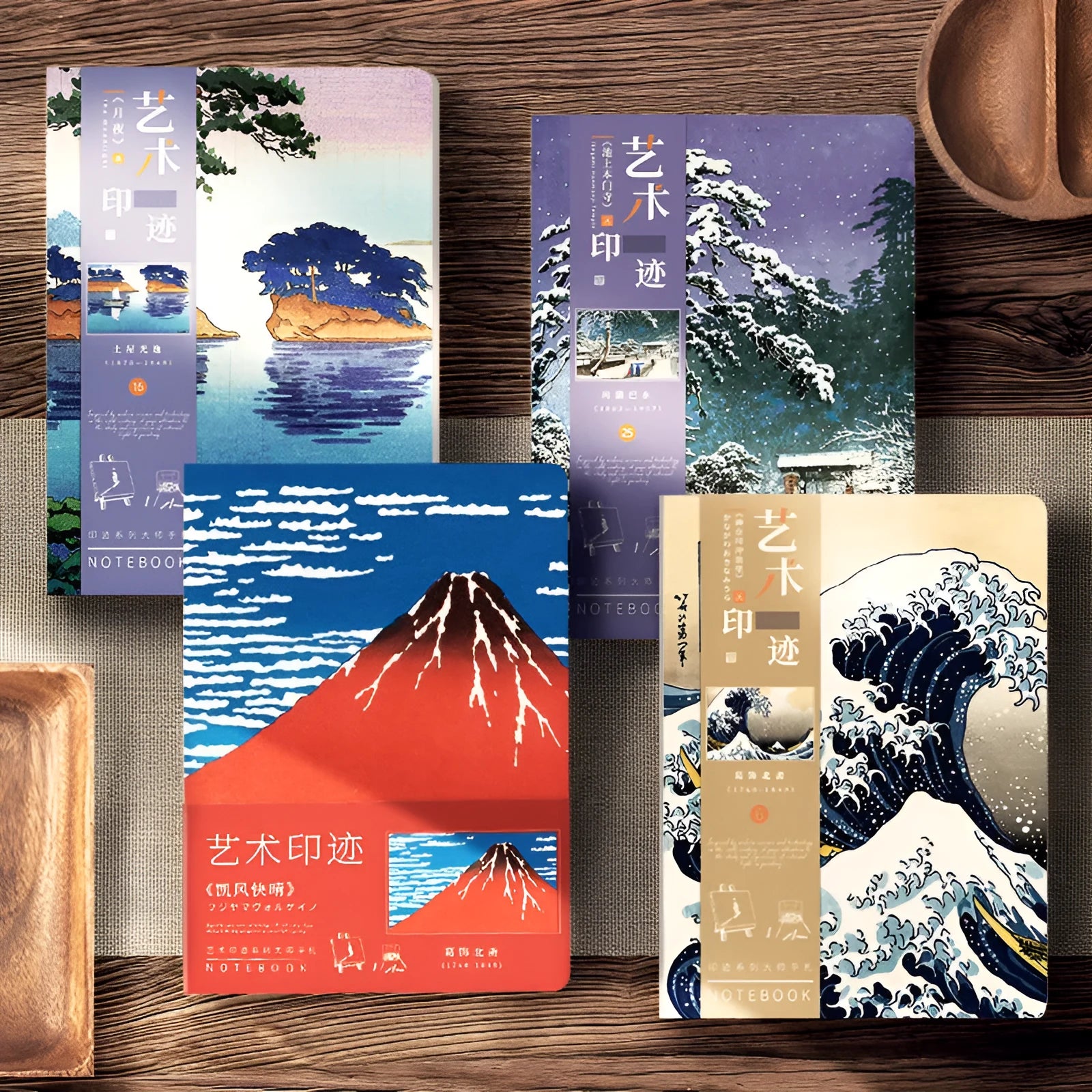 Hardcover Ukiyo-e art notebook open on a desk, showing the Kanagawa wave design and A5 size.