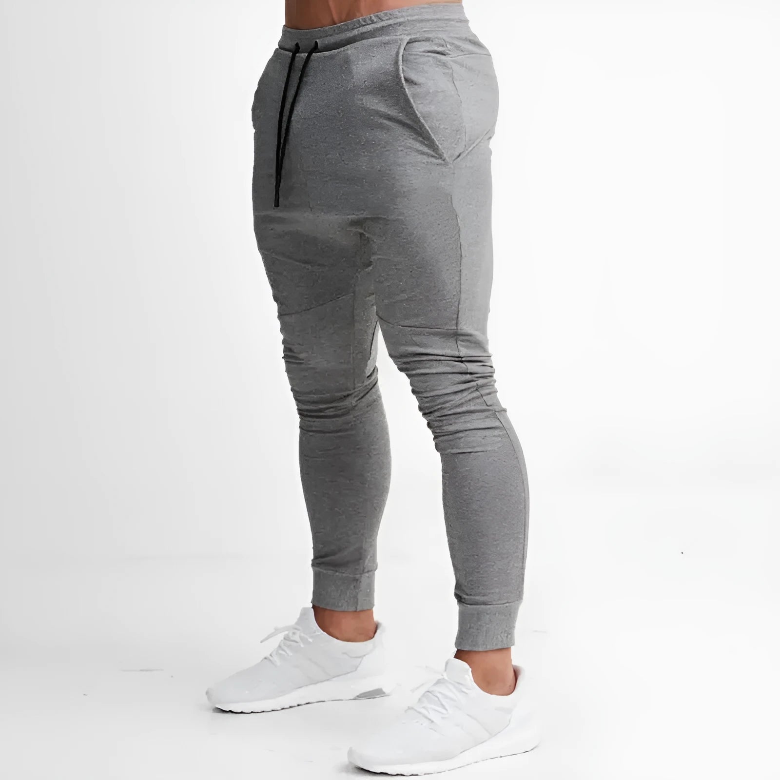 Men's slim fit gym pants in black with elastic waistband, available in multiple colours and sizes