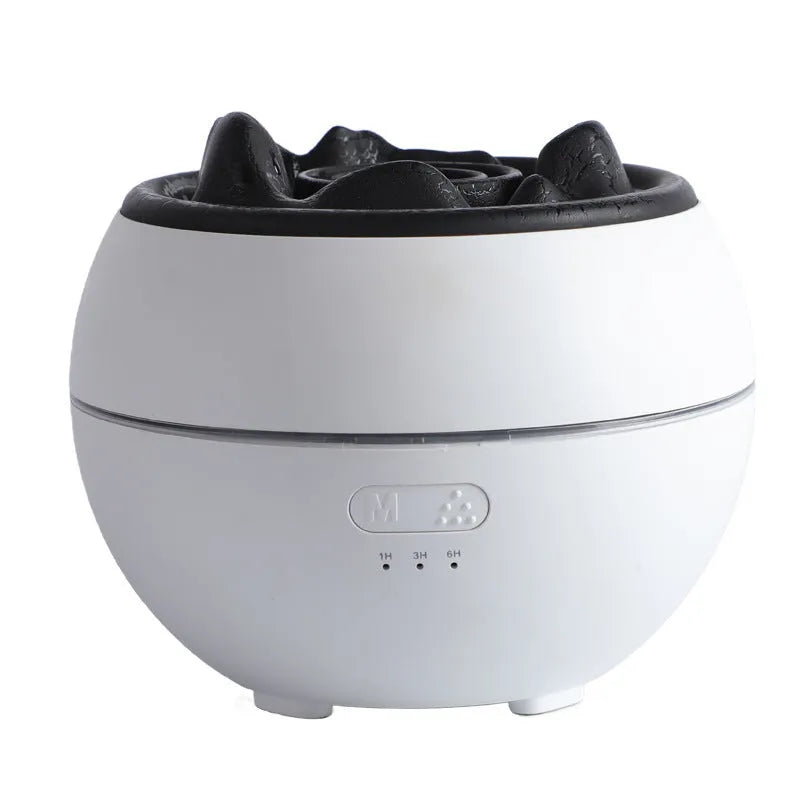 White crack-style flame aroma diffuser on a desk with mist and timer buttons visible