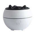 White crack-style flame aroma diffuser on a desk with mist and timer buttons visible