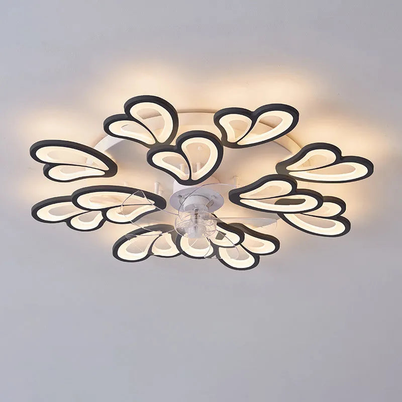Modern white ceiling fan light with six-blade design and integrated light fitting on a room ceiling.