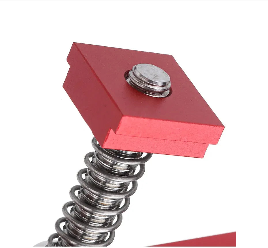 Red aluminium alloy woodworking table block slide holder with a flat mouth and handle.