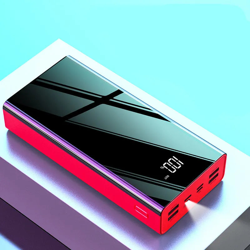 Large 40000mAh portable power bank with LCD screen in red or black colour.