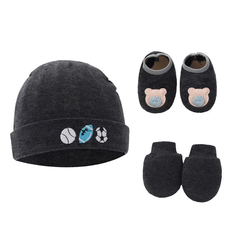 Set of white, light blue, and grey cotton baby pullover caps, gloves, and foot covers for infants.