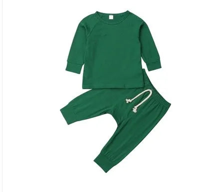 Blue cotton baby romper tracksuit set with cartoon pattern, shown on size chart for 6M to 24M.