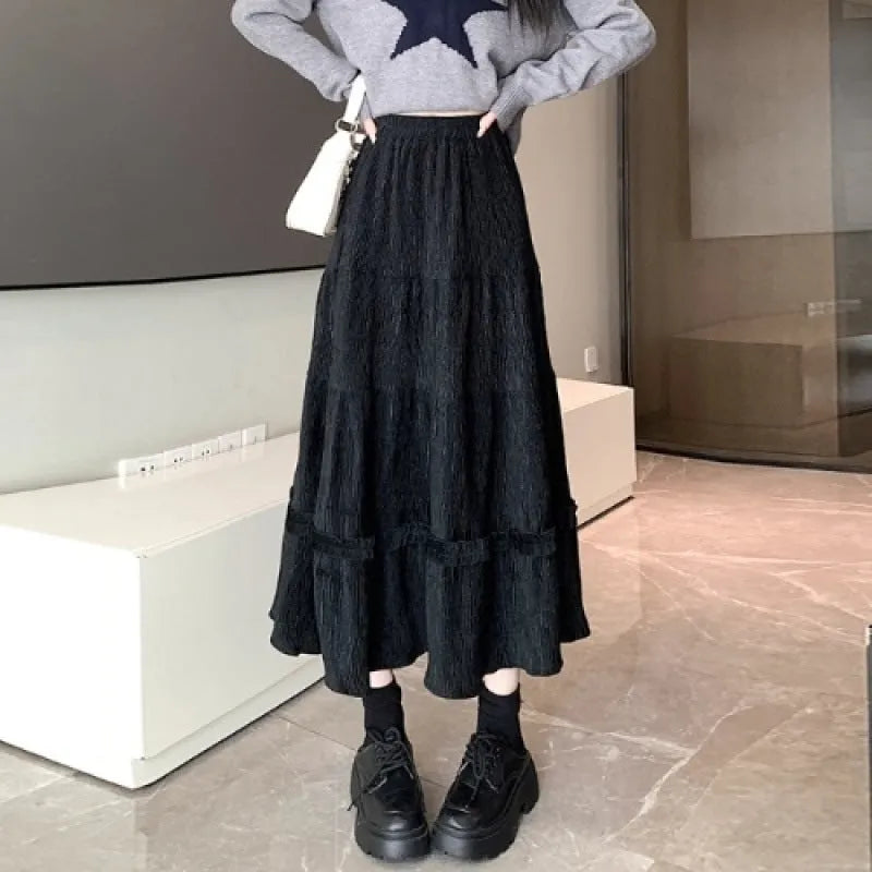 Korean style A-line corduroy skirt with elastic waistband in milky white colour.