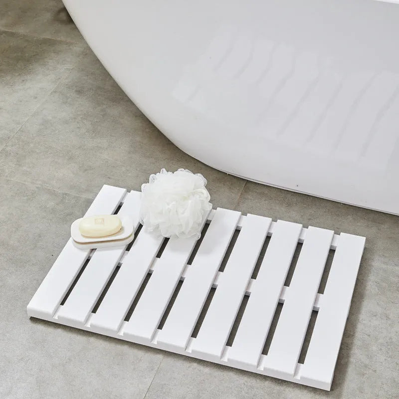 Bamboo bathroom height increasing non-slip foot pad in solid colour, 54x36x4cm rectangular shape.