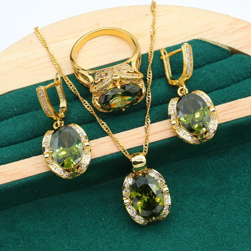 Women's zircon jewellery set with rhinestone decoration on snake bones chain in olive green colour
