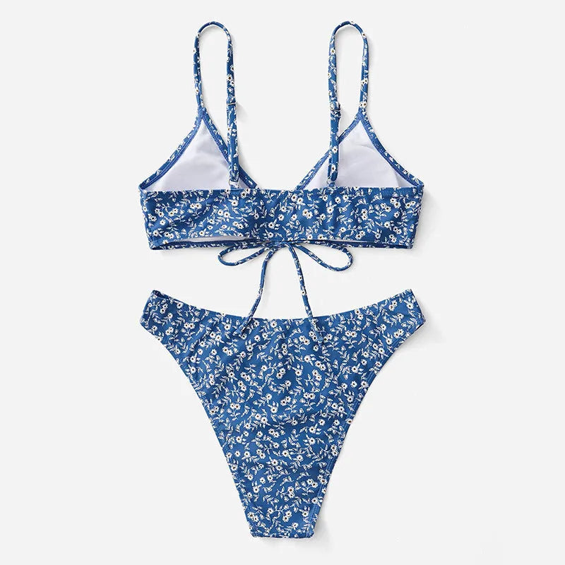 Blue polyester swimsuit three-piece set with top and shorts for swimming.