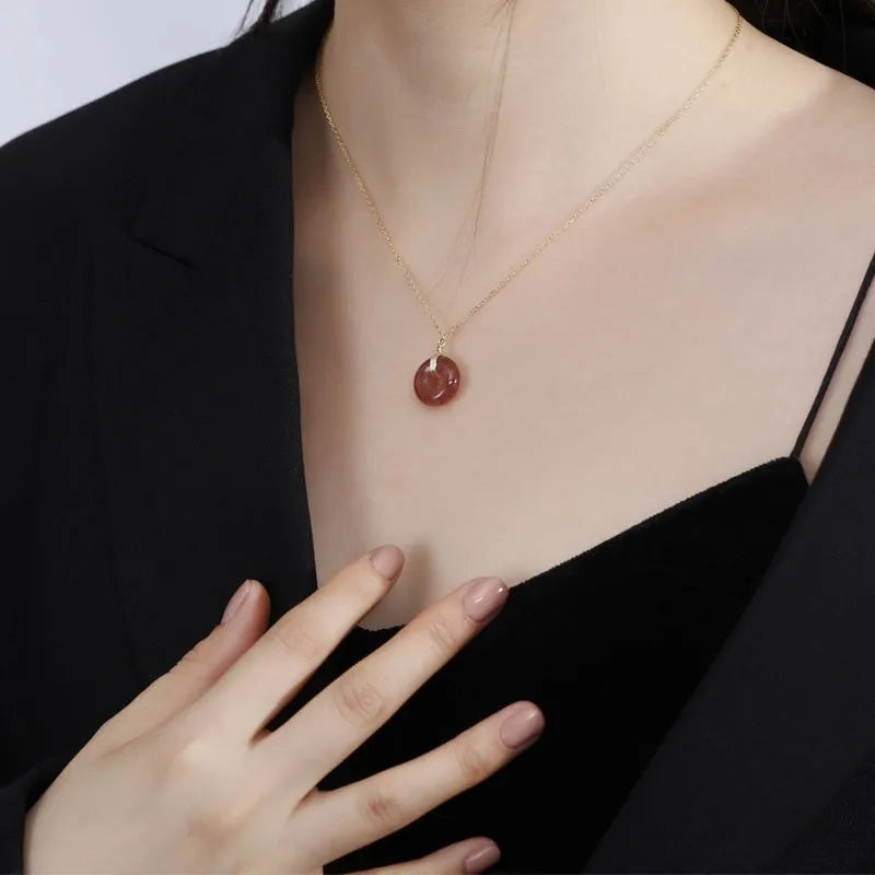 S925 sterling silver necklace with strawberry quartz peace buckle pendant on adjustable cross chain