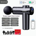 Konka V19 grey professional electric massage gun with multiple silicone attachment heads on a table.