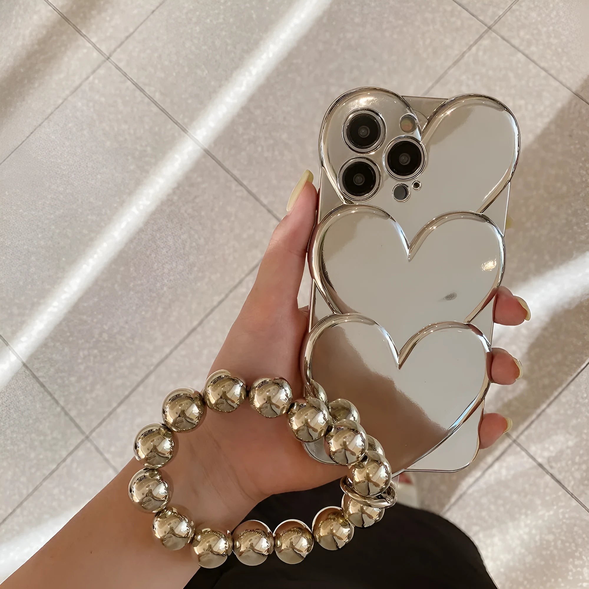 Electroplating love heart pattern iPhone case in soft TPU material on mobile phone